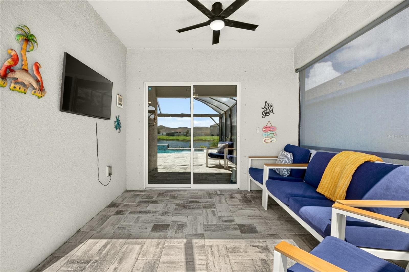 Lanai - roll-up sun shade - 17206 RESERVA DR, BRADENTON