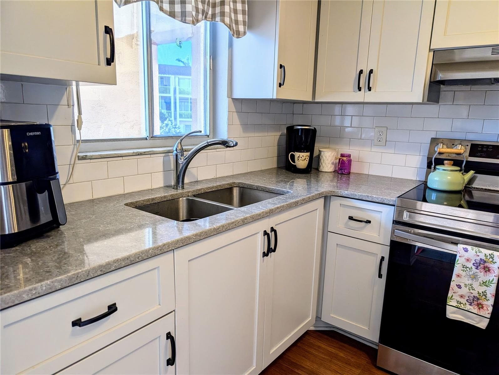 Quartz countertops, modern cabinetry... - 4133 HERON WAY #E-202, BRADENTON