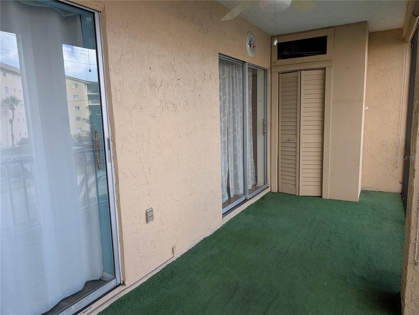 Sliding glass doors from both living & master bedrooms. - 4133 HERON WAY #E-202, BRADENTON