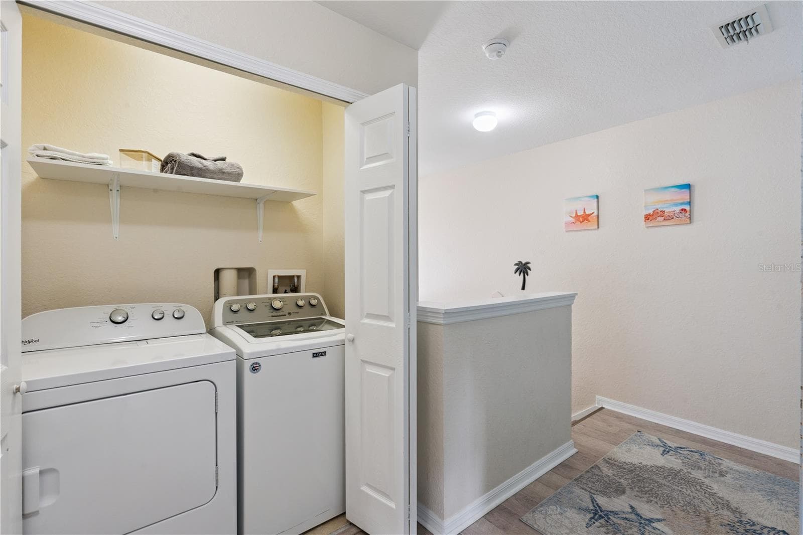 Laundry closet - 570 CALABRIA AVE, DAVENPORT