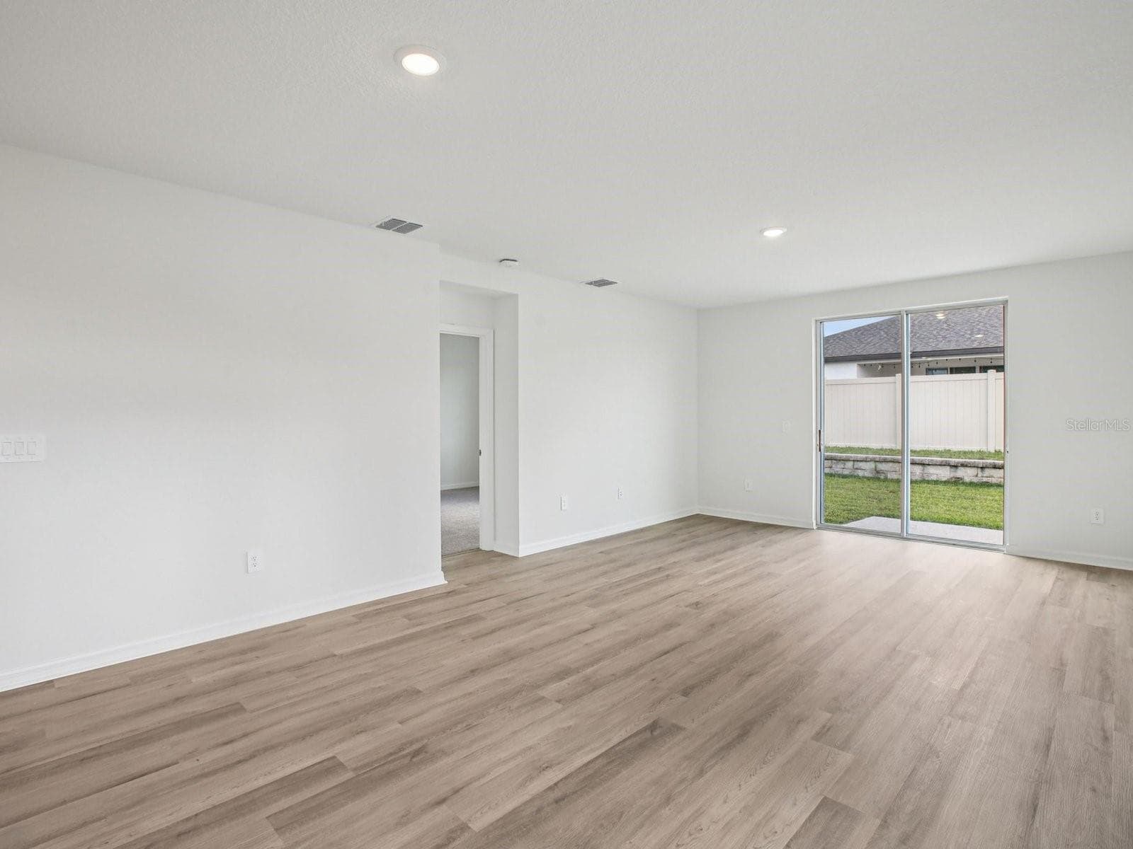 Photo is not of the actual home, but is an inspirational photo of builder’s model home and may depict options, furnishings, and/or decorator features that are not included - 1556 BREKEY WAY, ZEPHYRHILLS