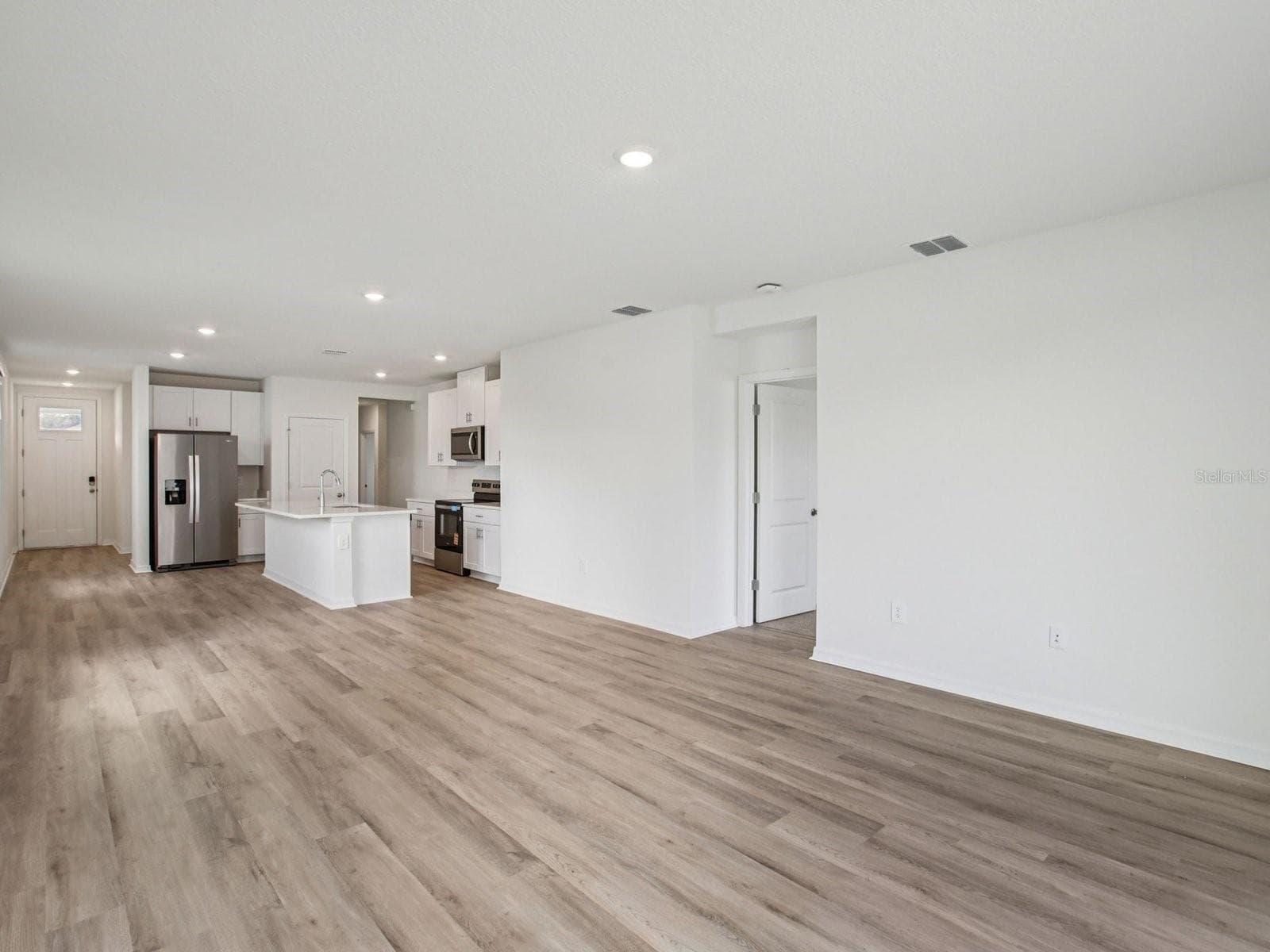 Photo is not of the actual home, but is an inspirational photo of builder’s model home and may depict options, furnishings, and/or decorator features that are not included - 1556 BREKEY WAY, ZEPHYRHILLS