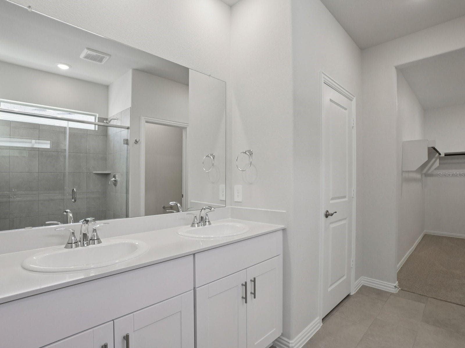 Photo is not of the actual home, but is an inspirational photo of builder’s model home and may depict options, furnishings, and/or decorator features that are not included - 1556 BREKEY WAY, ZEPHYRHILLS