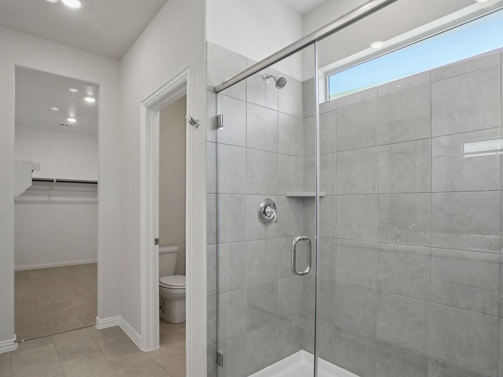 Photo is not of the actual home, but is an inspirational photo of builder’s model home and may depict options, furnishings, and/or decorator features that are not included - 1556 BREKEY WAY, ZEPHYRHILLS