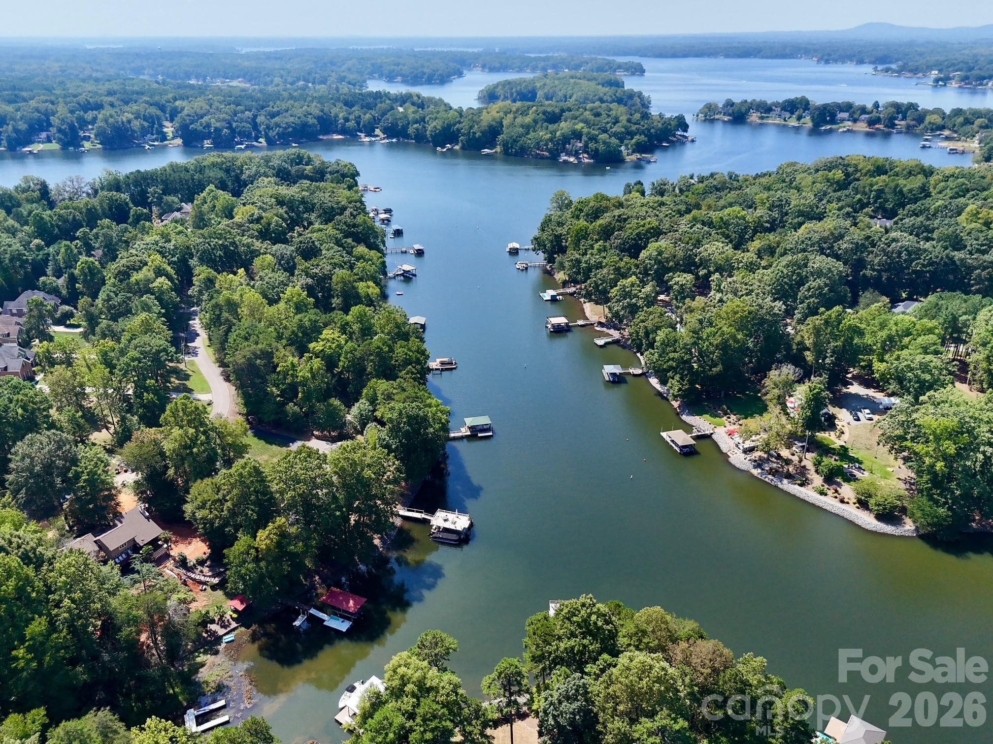 Home is at end of no-wake zone cove in McCrary Creek with 1/2 mile views. Perfect for all your water activities from swimming, floating, paddleboarding, kayaking, to boating. - 140 Holt Lane, Mooresville