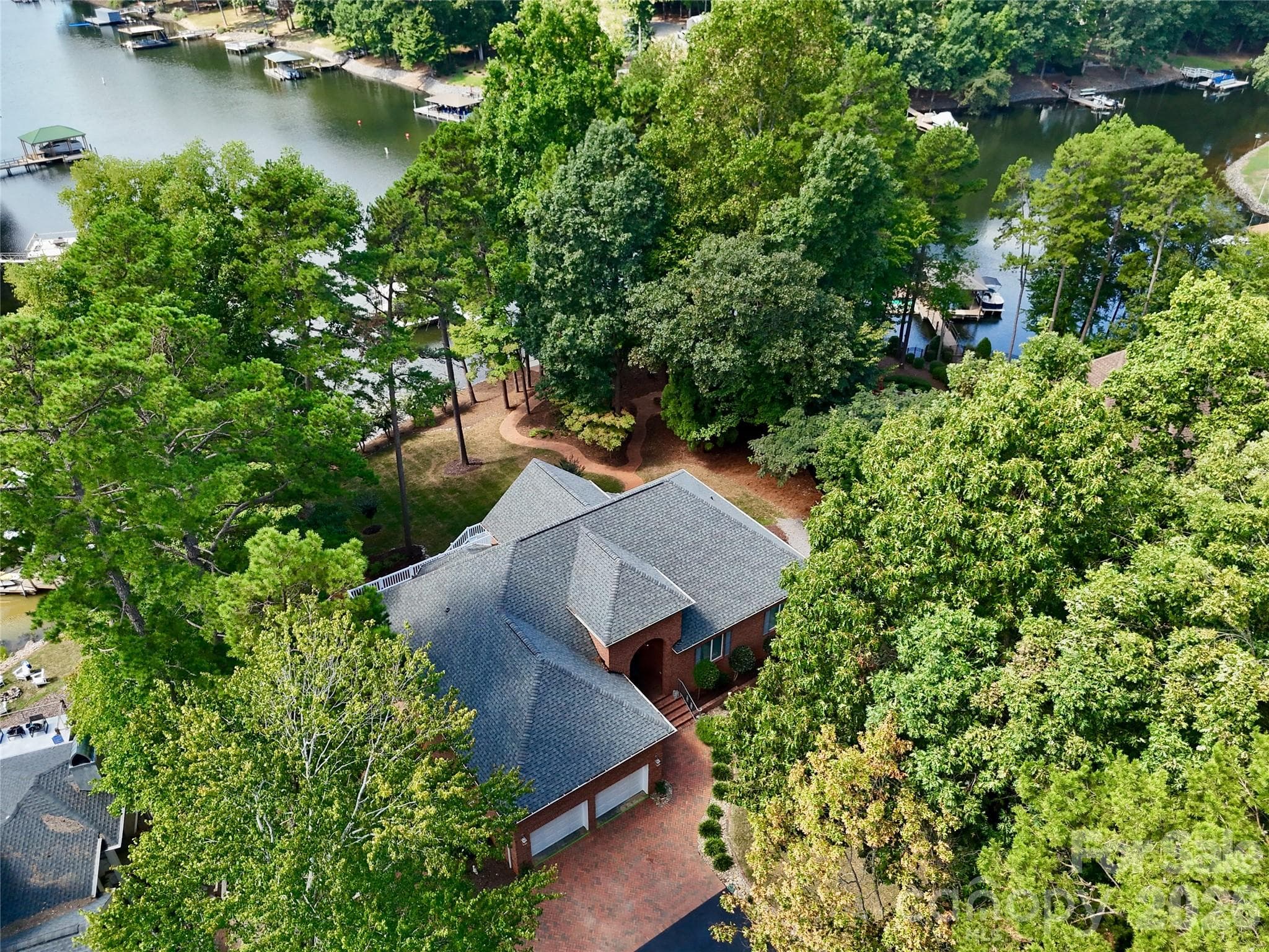 Overhead view of the home and surrounding trees for privacy. - 140 Holt Lane, Mooresville