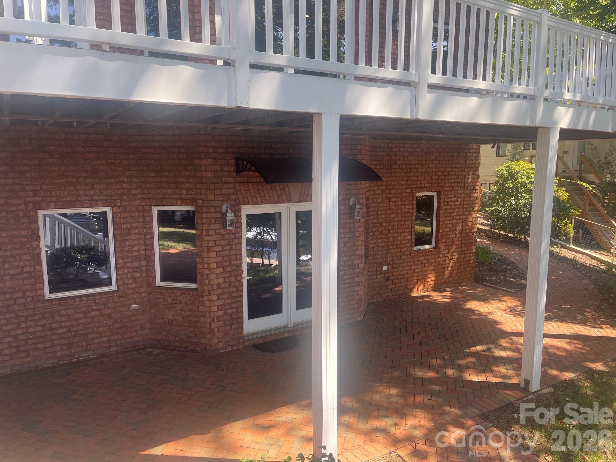 Brick paver patio off downstairs to enjoy grilling, sipping, relaxing... - 140 Holt Lane, Mooresville