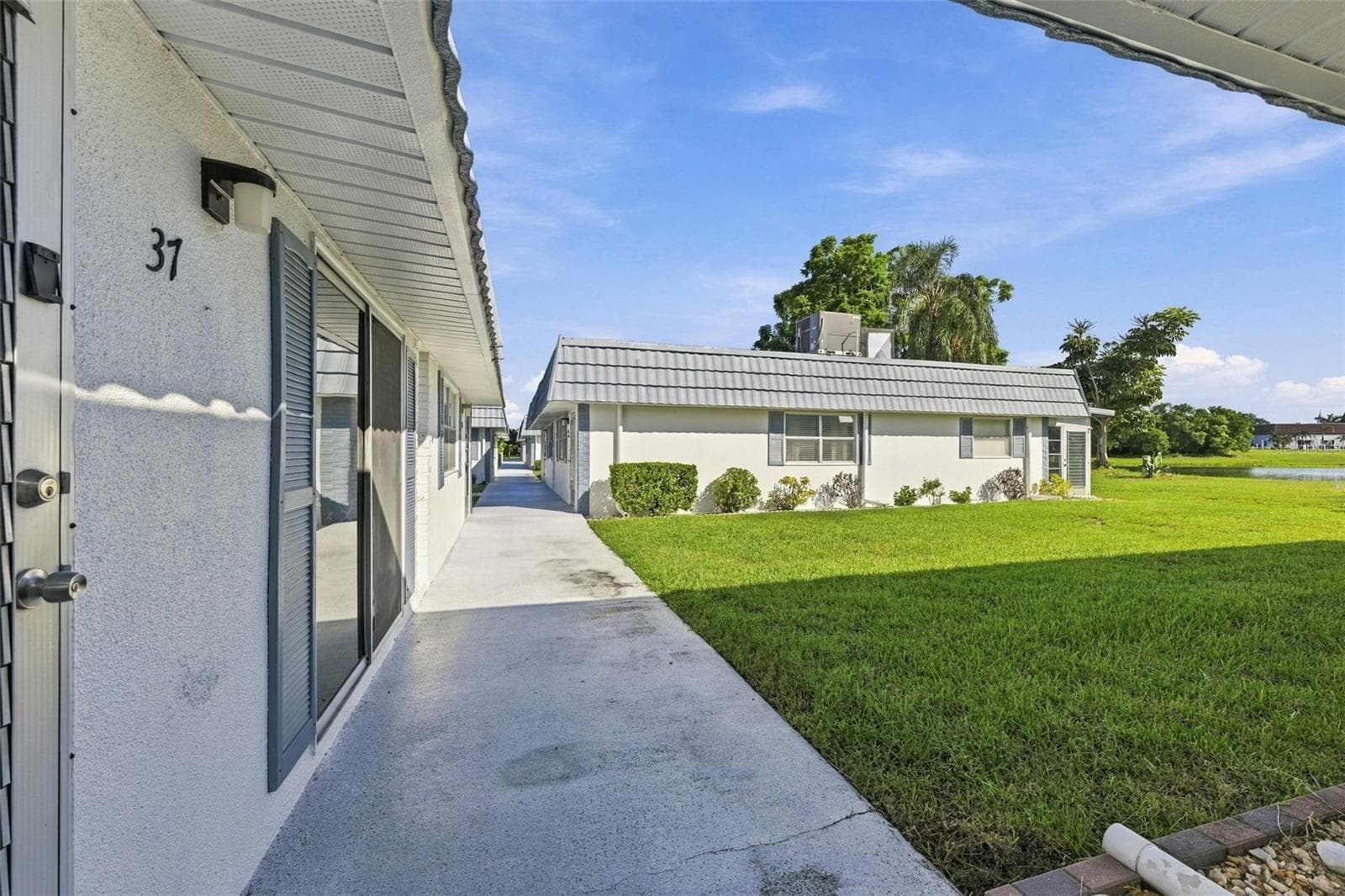Walkway to your home - 1901 ANDOVER WAY #37, SUN CITY CENTER