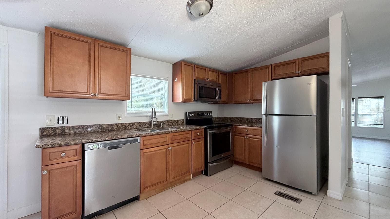 Manufactured Home at 821 NAVAJO DR, ST CLOUD, photo 9 of 27