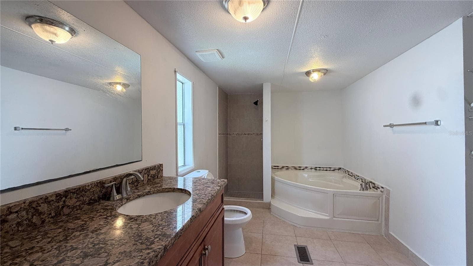 Manufactured Home at 821 NAVAJO DR, ST CLOUD, photo 20 of 27