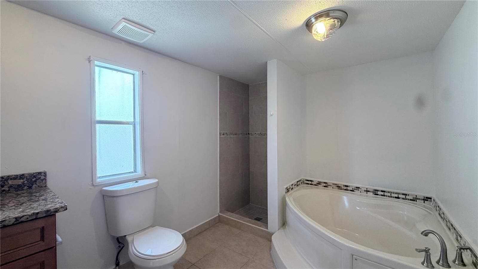 Manufactured Home at 821 NAVAJO DR, ST CLOUD, photo 21 of 27