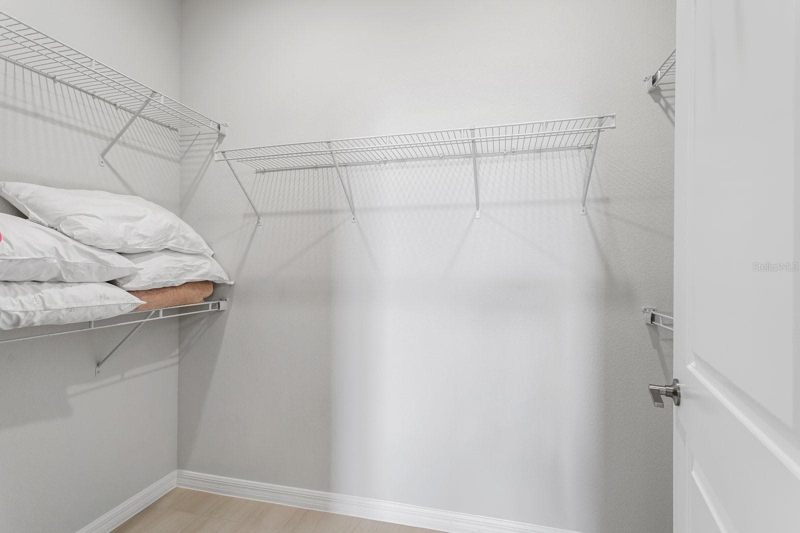 Primary Walk-In Closet - 1323 ORANGE VALLEY RD, MINNEOLA