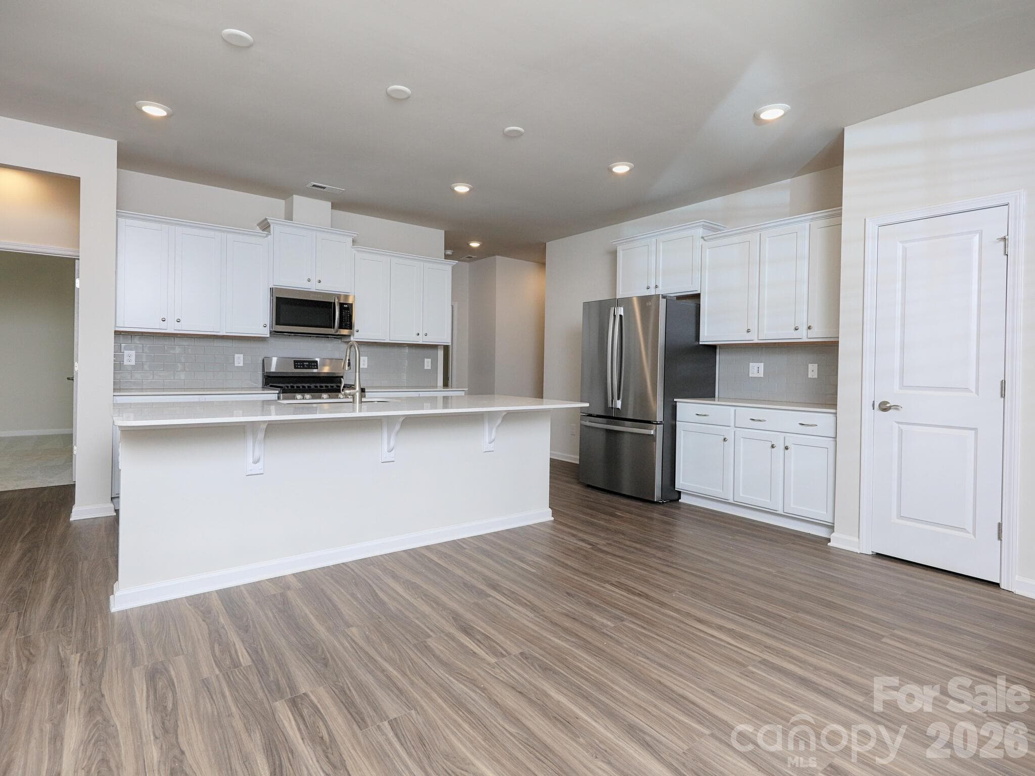 Spacious and pretty with quartz countertops and subway tile backsplash - 121 Olive Tea Lane, Statesville