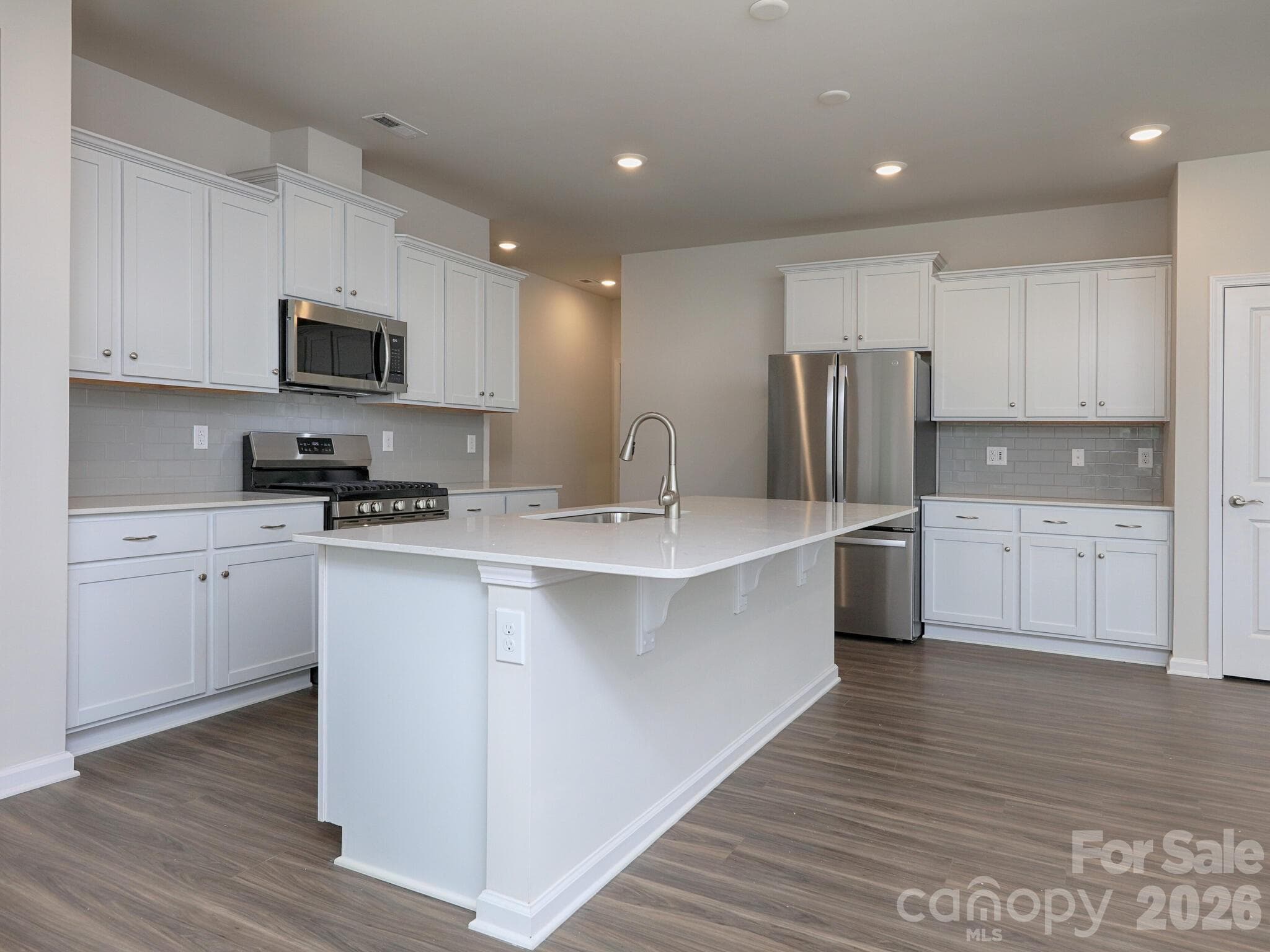 White cabinets with soft close hinges - 121 Olive Tea Lane, Statesville