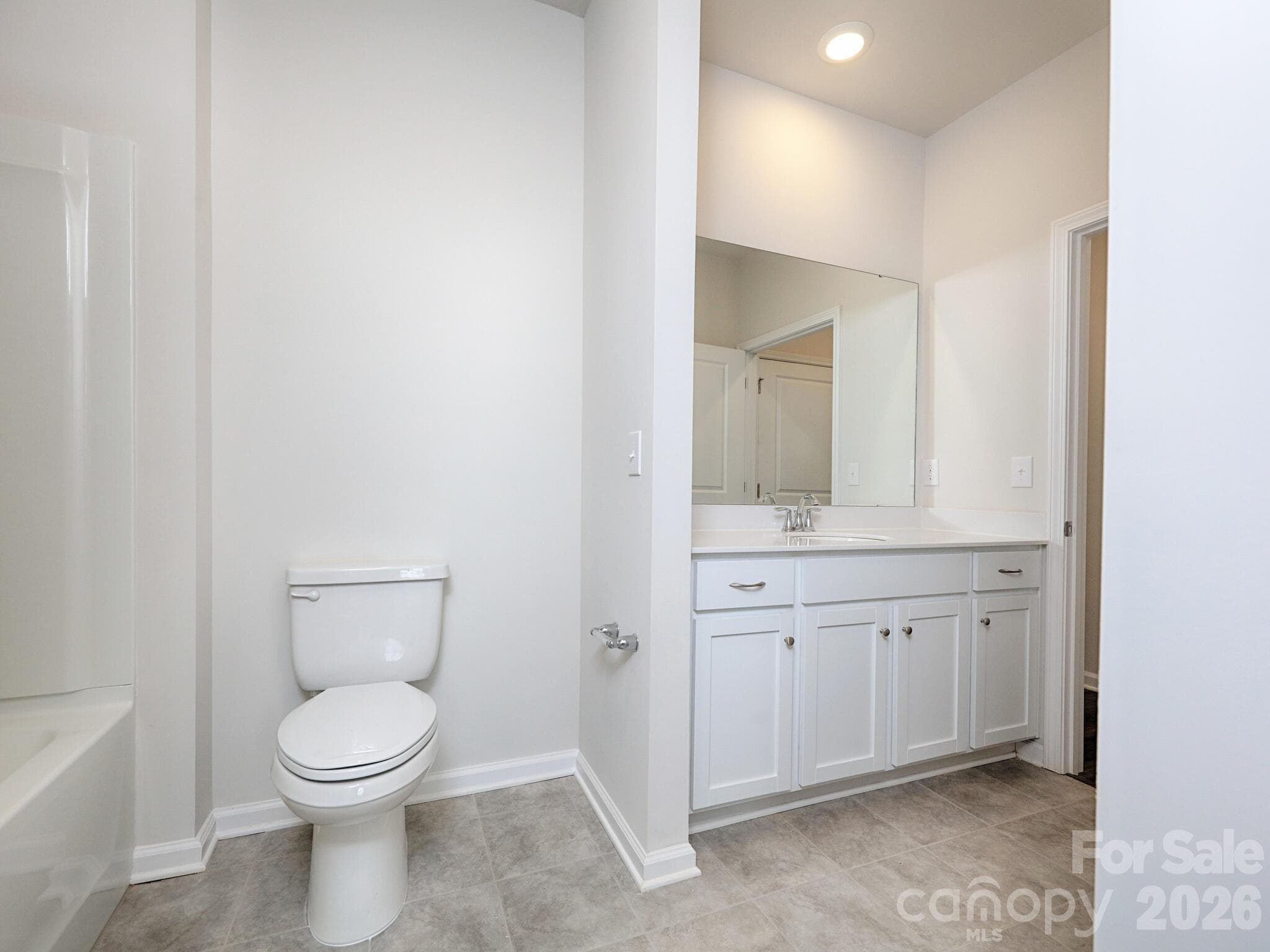 Full hall bathroom with tile floor - 121 Olive Tea Lane, Statesville