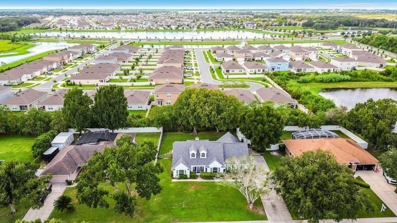 Aerial Views of home and neighborhood - 1508 JENNI LEE CT, KISSIMMEE