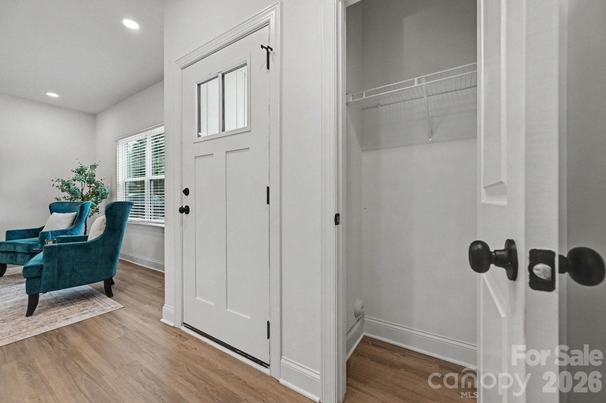 Welcoming entry with convenient main-level access. - 53 E 13th Street, Newton