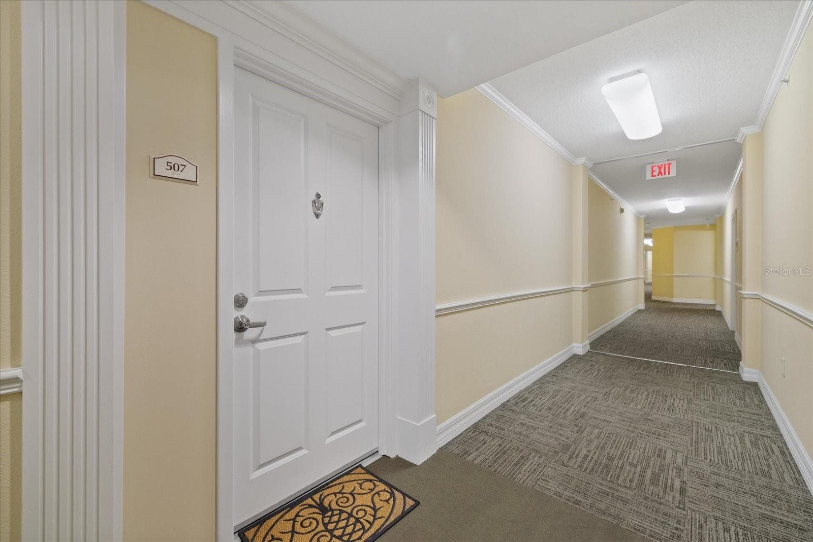 Front Door to condo from hallway on 5th floor - 4516 SEAGULL DR #507, NEW PORT RICHEY