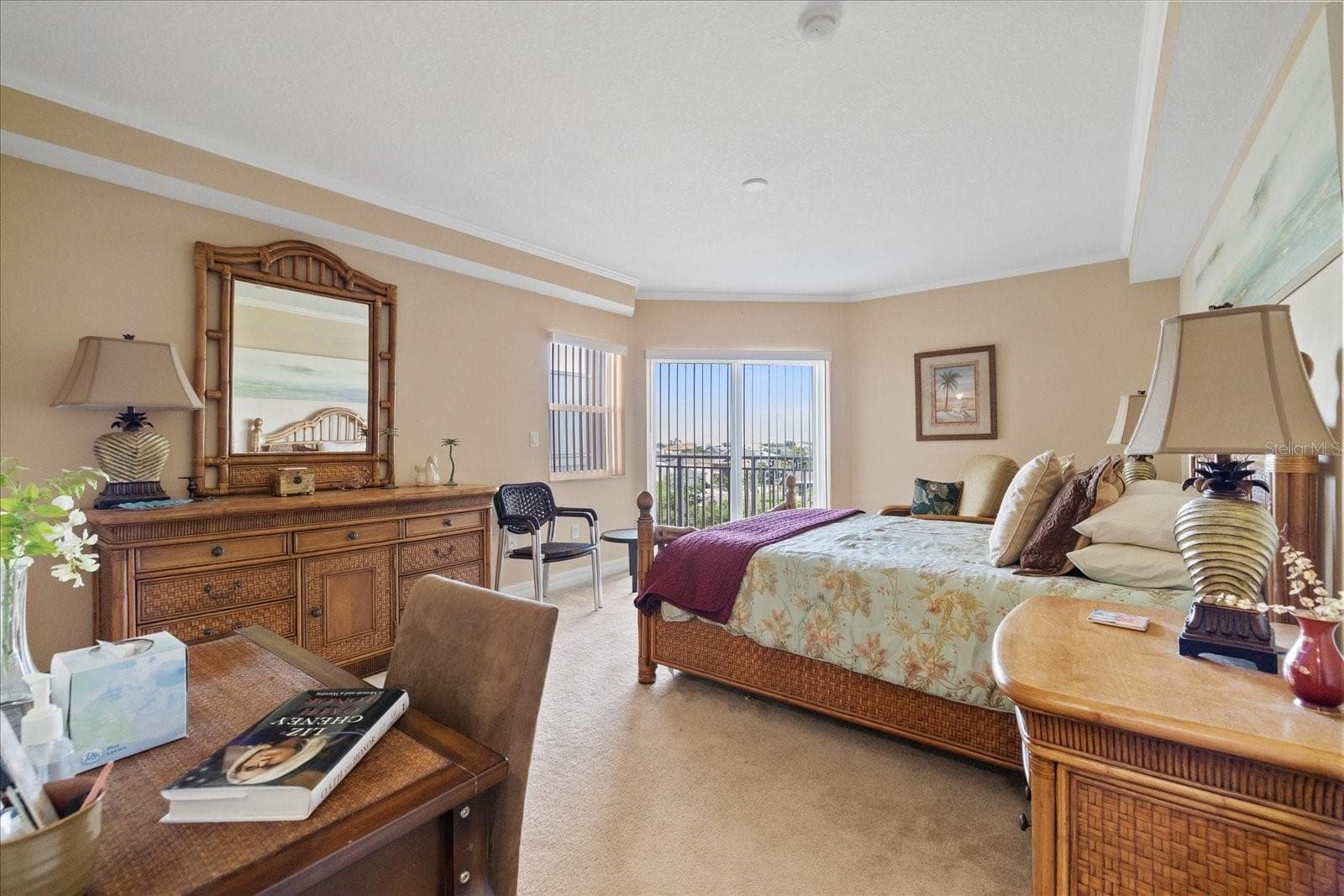 Primary bedroom with balcony sliders - 4516 SEAGULL DR #507, NEW PORT RICHEY