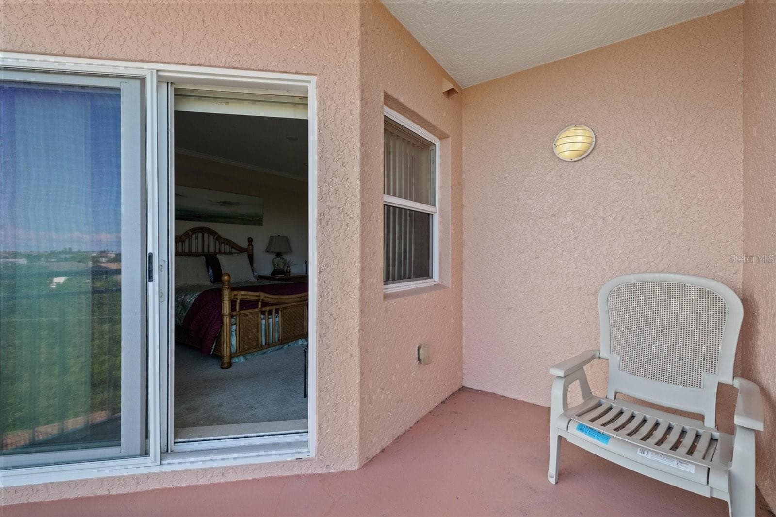 door from primary bedroom to balcony - 4516 SEAGULL DR #507, NEW PORT RICHEY