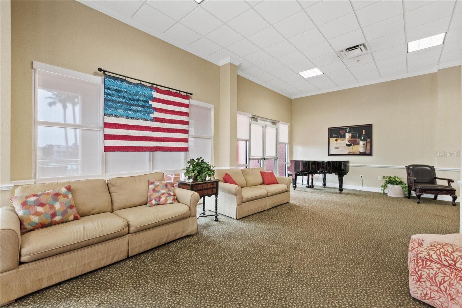 community room with piano - 4516 SEAGULL DR #507, NEW PORT RICHEY