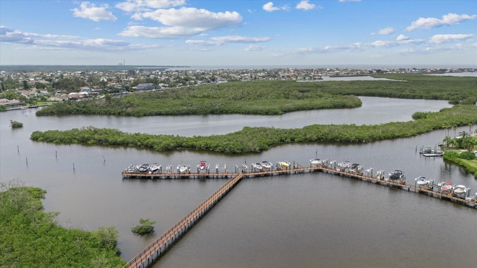 View of condo pier and boat slips(some available to rent at times) - 4516 SEAGULL DR #507, NEW PORT RICHEY