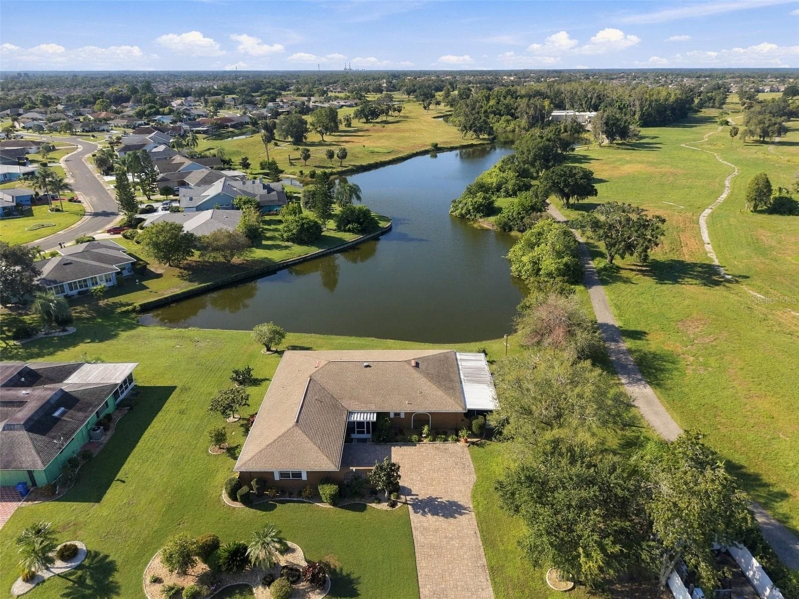 Stunning water frontage, wild life and privacy is all here for you to enjoy. - 211 STONEHAM DR, SUN CITY CENTER