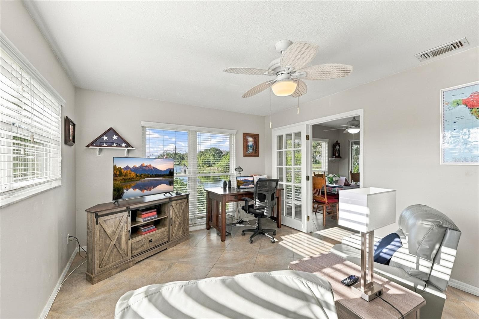 Large and spacious with a glass pane door for an updated look and what a view!! - 211 STONEHAM DR, SUN CITY CENTER