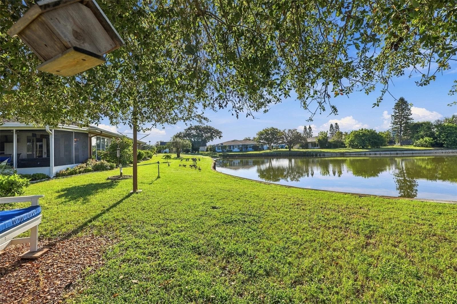 Side view of the backyard. - 211 STONEHAM DR, SUN CITY CENTER