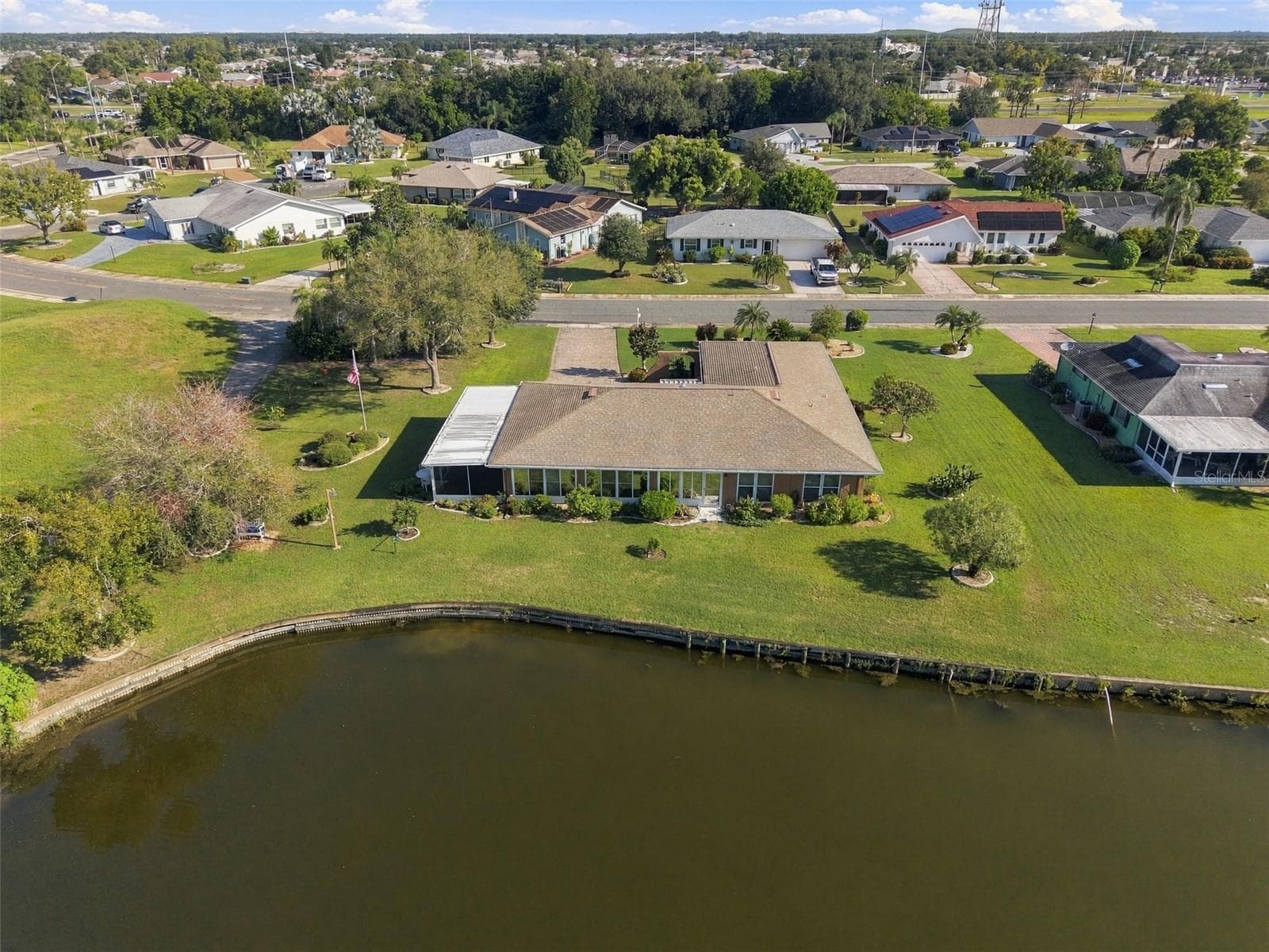 Rear view of property. - 211 STONEHAM DR, SUN CITY CENTER