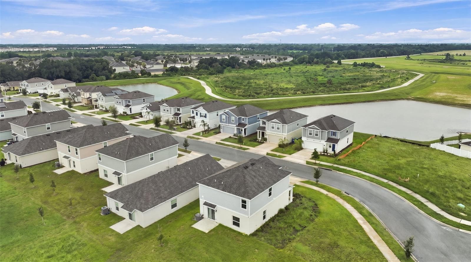 Aerial view of the property and the community - 506 BELL PRAIRIE CIR, LAKE WALES