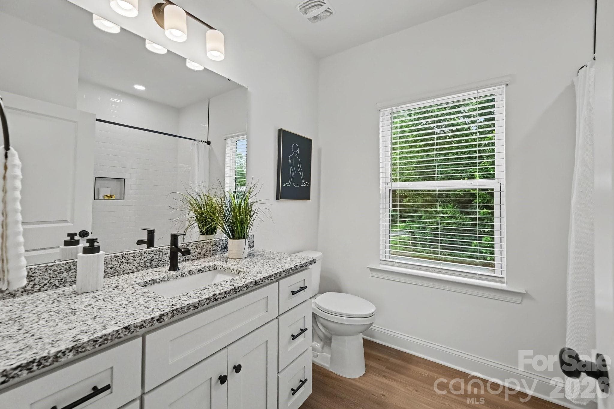 Bright bath with modern finishes. - 45 E 13th Street, Newton