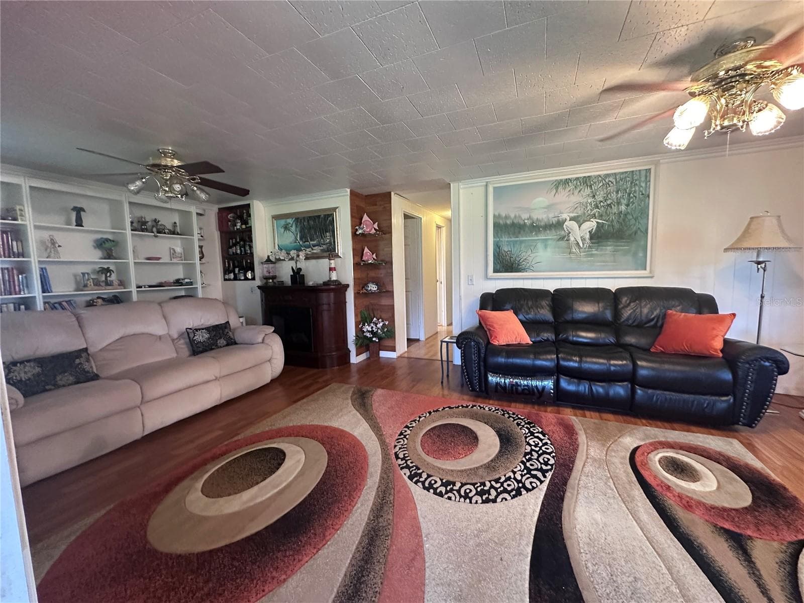 Living room with golf course view - 1100 BELCHER RD S #417, LARGO