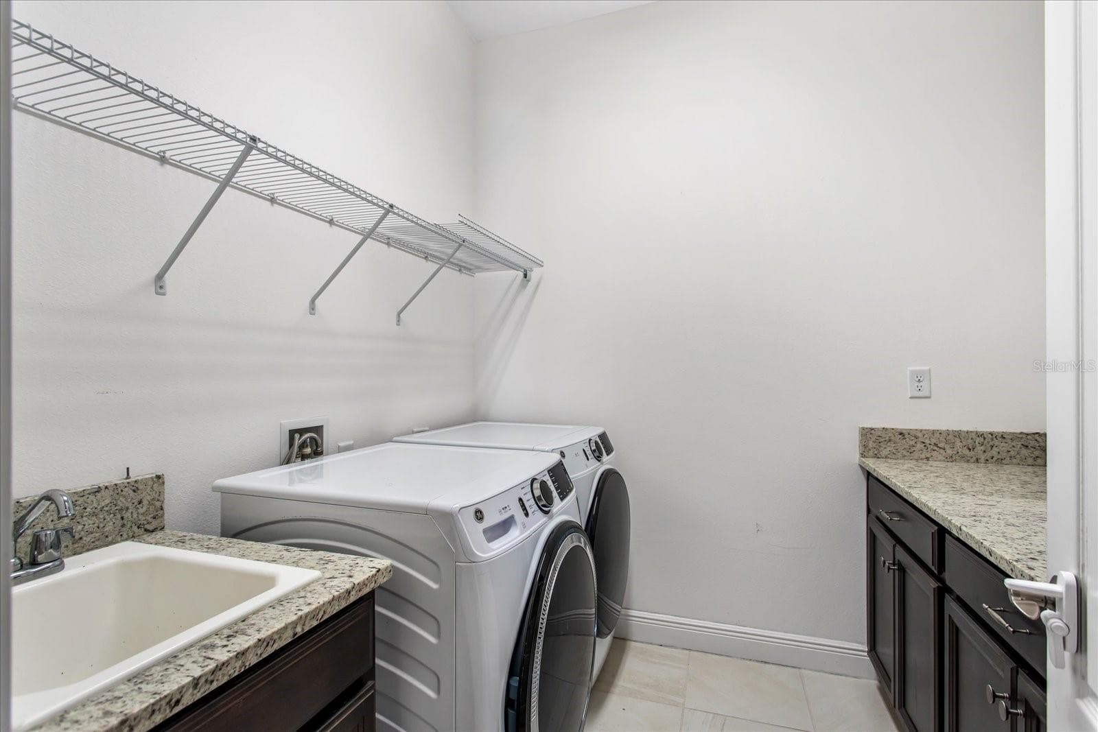 Inside laundry room. - 14121 ALAFAYA OAK BND, ORLANDO