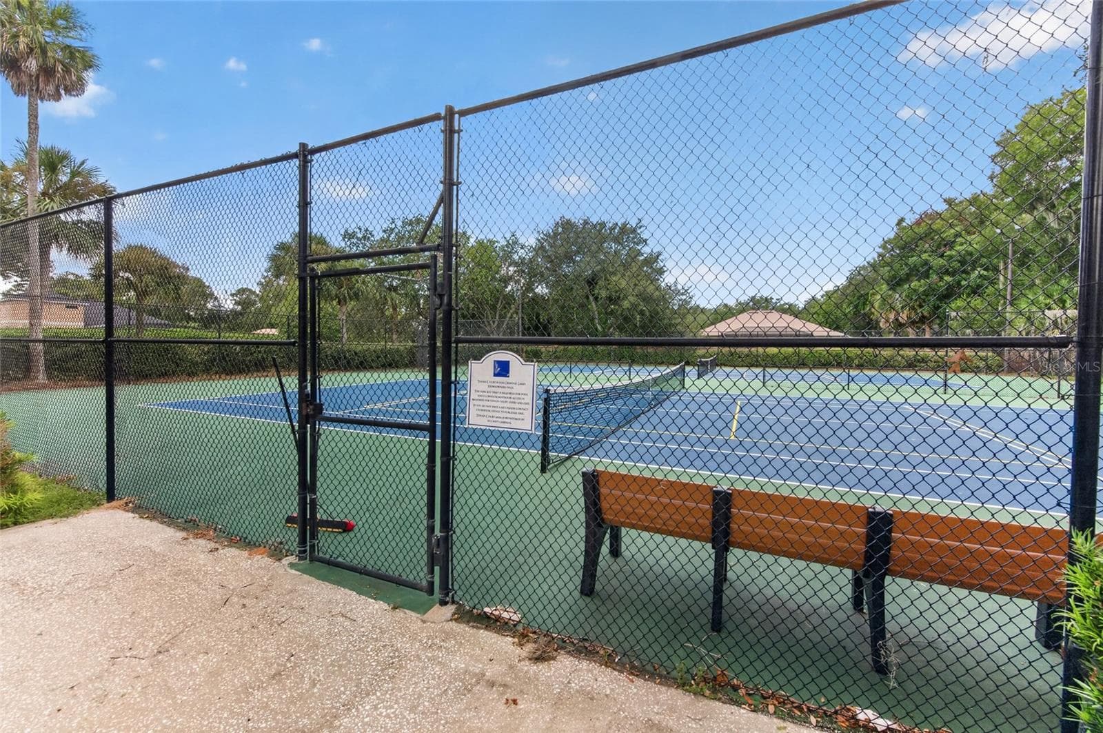 Lighted tennis + pickeball courts - 12 OLD CREEK CIR, ORMOND BEACH