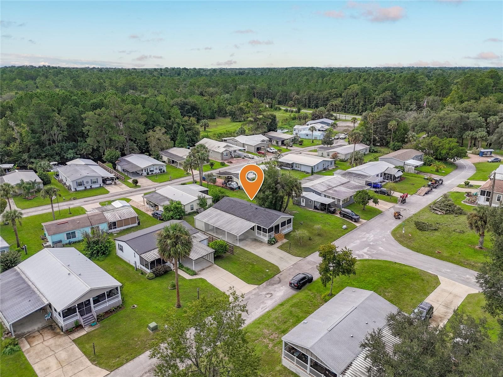 Manufactured Home at 108 PINE LAKE DR, SATSUMA, photo 2 of 31