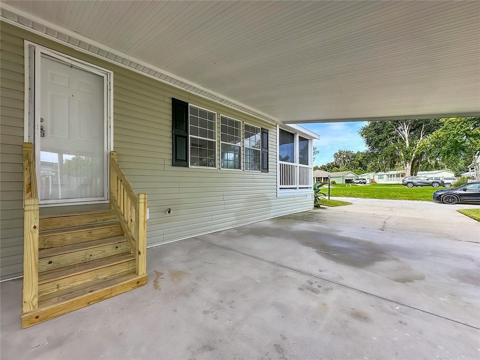 Manufactured Home at 108 PINE LAKE DR, SATSUMA, photo 23 of 31