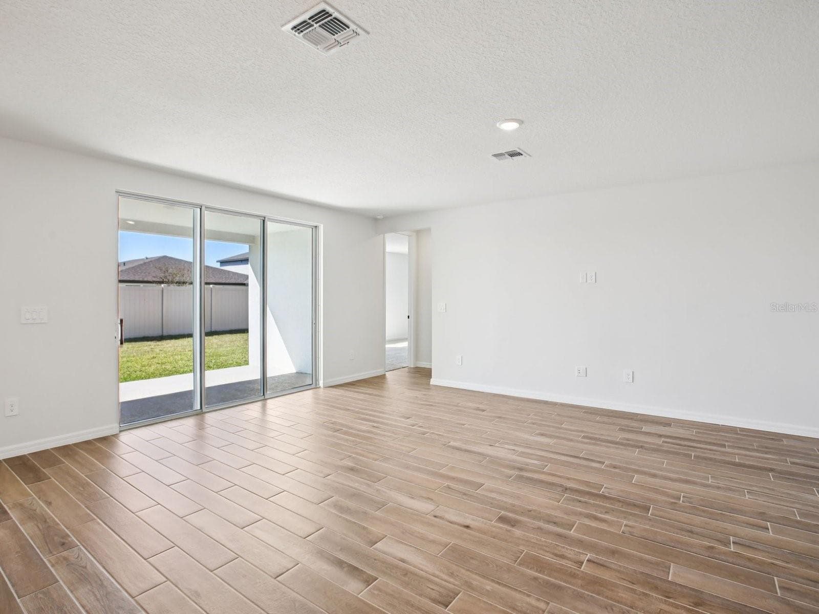 Photo is not of the actual home, but is an inspirational photo of builder’s model home and may depict options, furnishings, and/or decorator features that are not included - 1681 DRAUGHTON DR, ZEPHYRHILLS