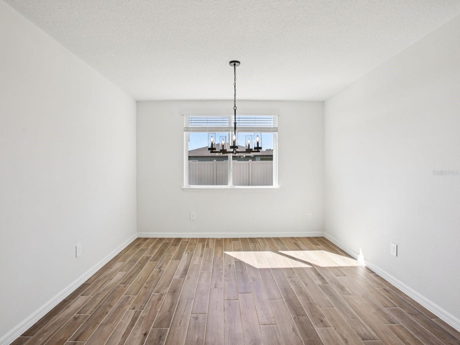 Photo is not of the actual home, but is an inspirational photo of builder’s model home and may depict options, furnishings, and/or decorator features that are not included - 1681 DRAUGHTON DR, ZEPHYRHILLS