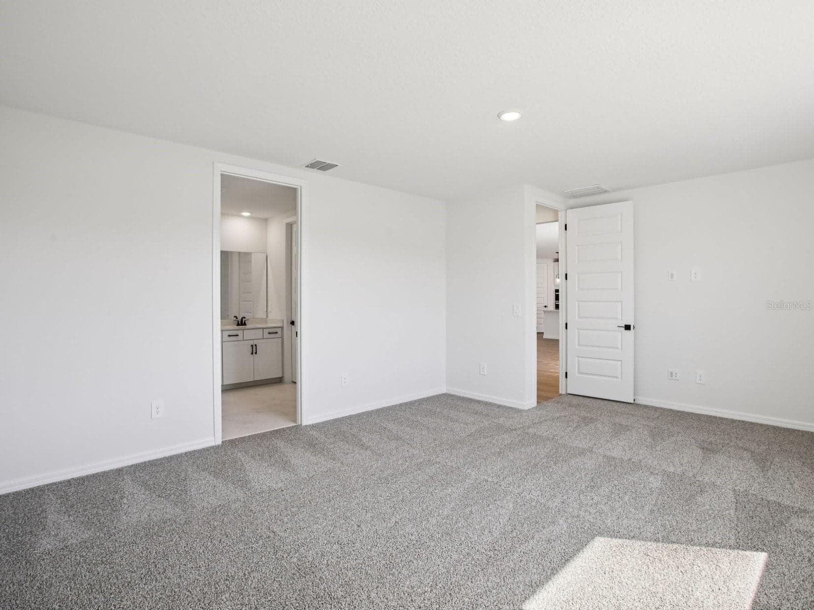 Photo is not of the actual home, but is an inspirational photo of builder’s model home and may depict options, furnishings, and/or decorator features that are not included - 1681 DRAUGHTON DR, ZEPHYRHILLS