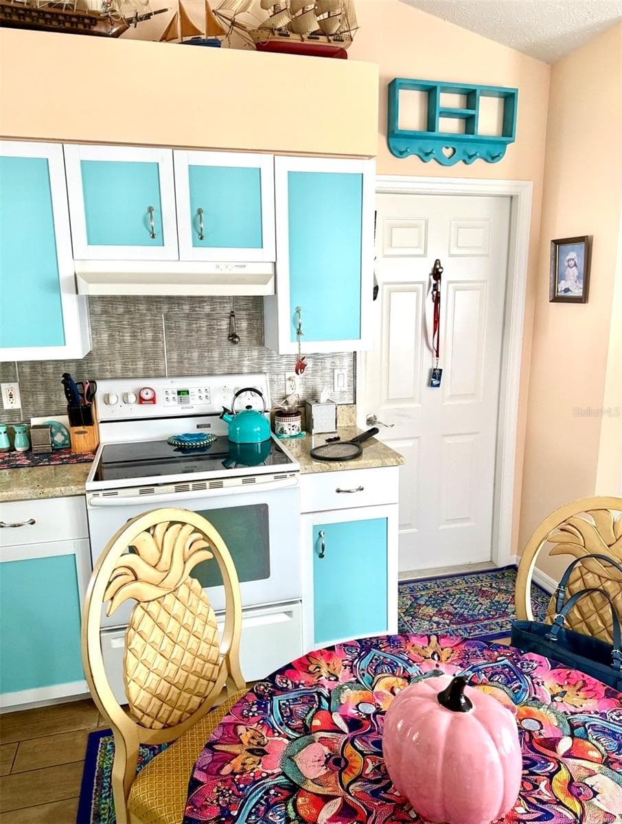 kitchen with view of door to garage - 10440 S CLINT LOOP, FLORAL CITY
