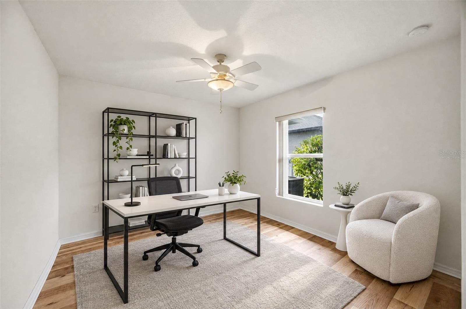 Virtually staged - Bedroom shown as a home office - 244 FAIRWAY RD, ROTONDA WEST
