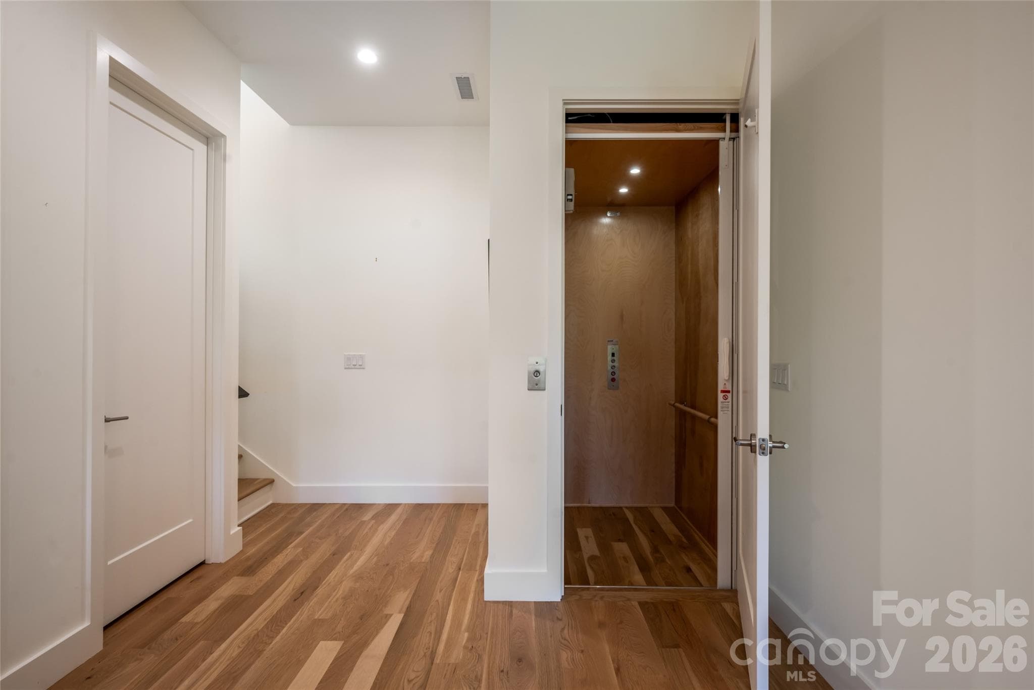 Elevator between floors to accommodate aging in place - 6 River Run, Asheville