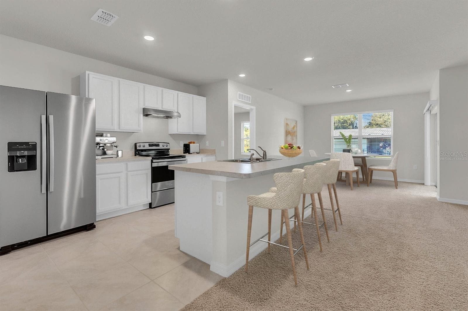 Kitchen and island - virtually staged - 2412 FIELDBROOKE WAY, EDGEWATER