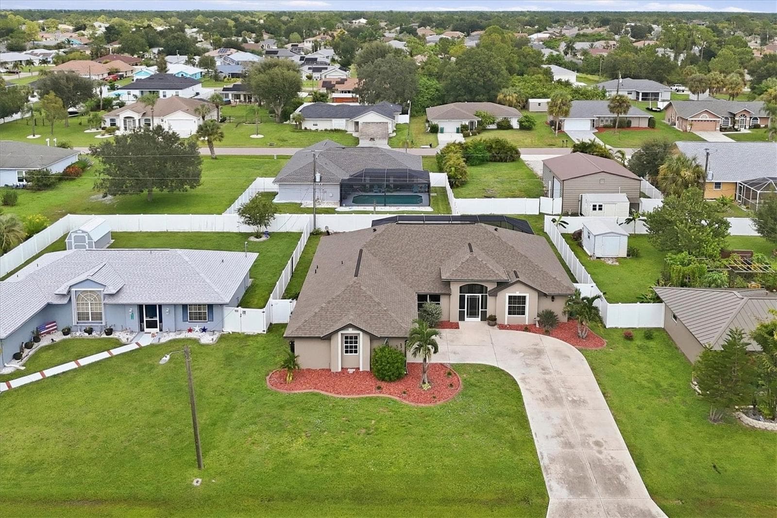 front aerial photo shed and garage on lot to right behind is included in sale - 23108 AUGUST AVE, PORT CHARLOTTE