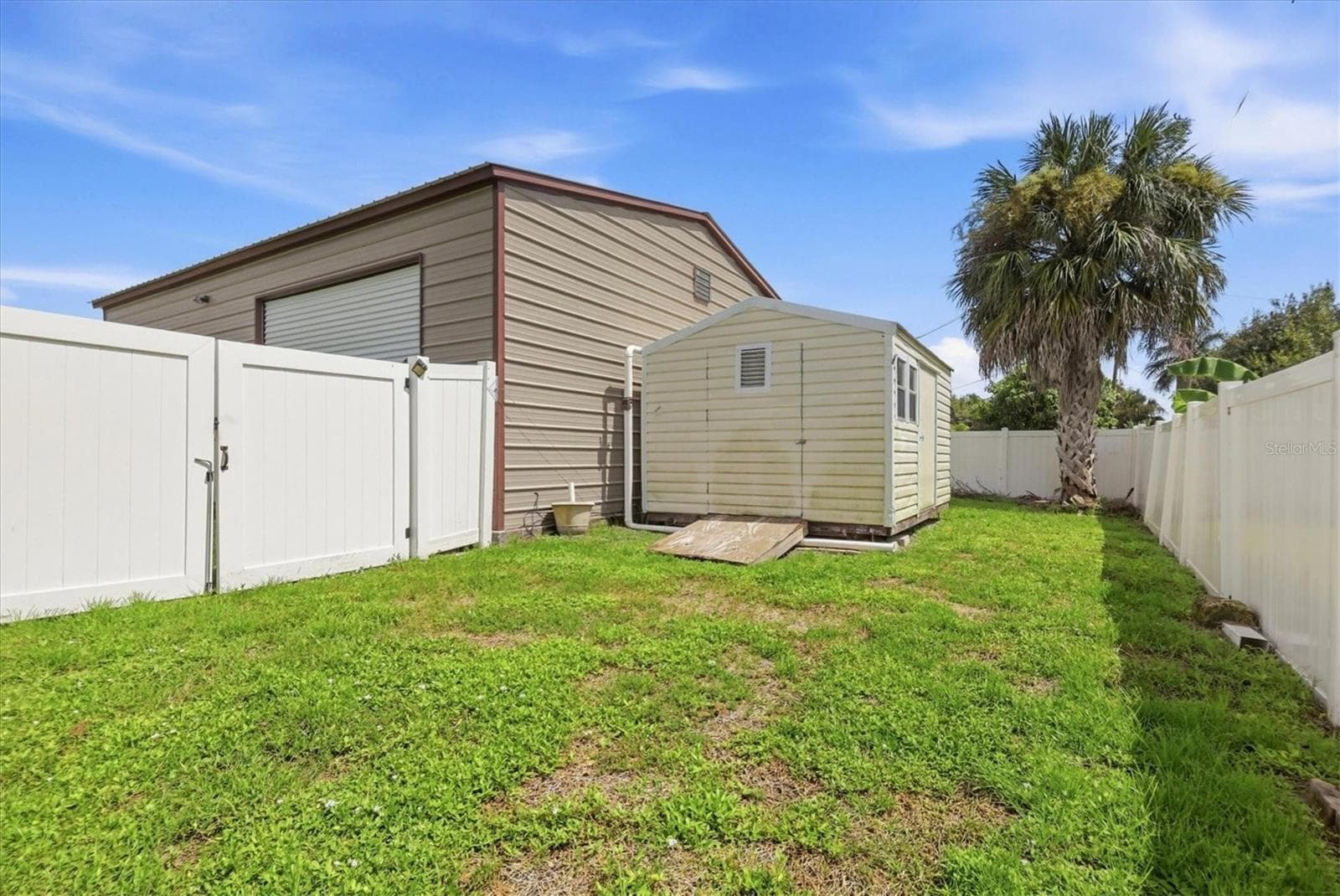 garage has 2 overhead doors - front as well as side - 23108 AUGUST AVE, PORT CHARLOTTE