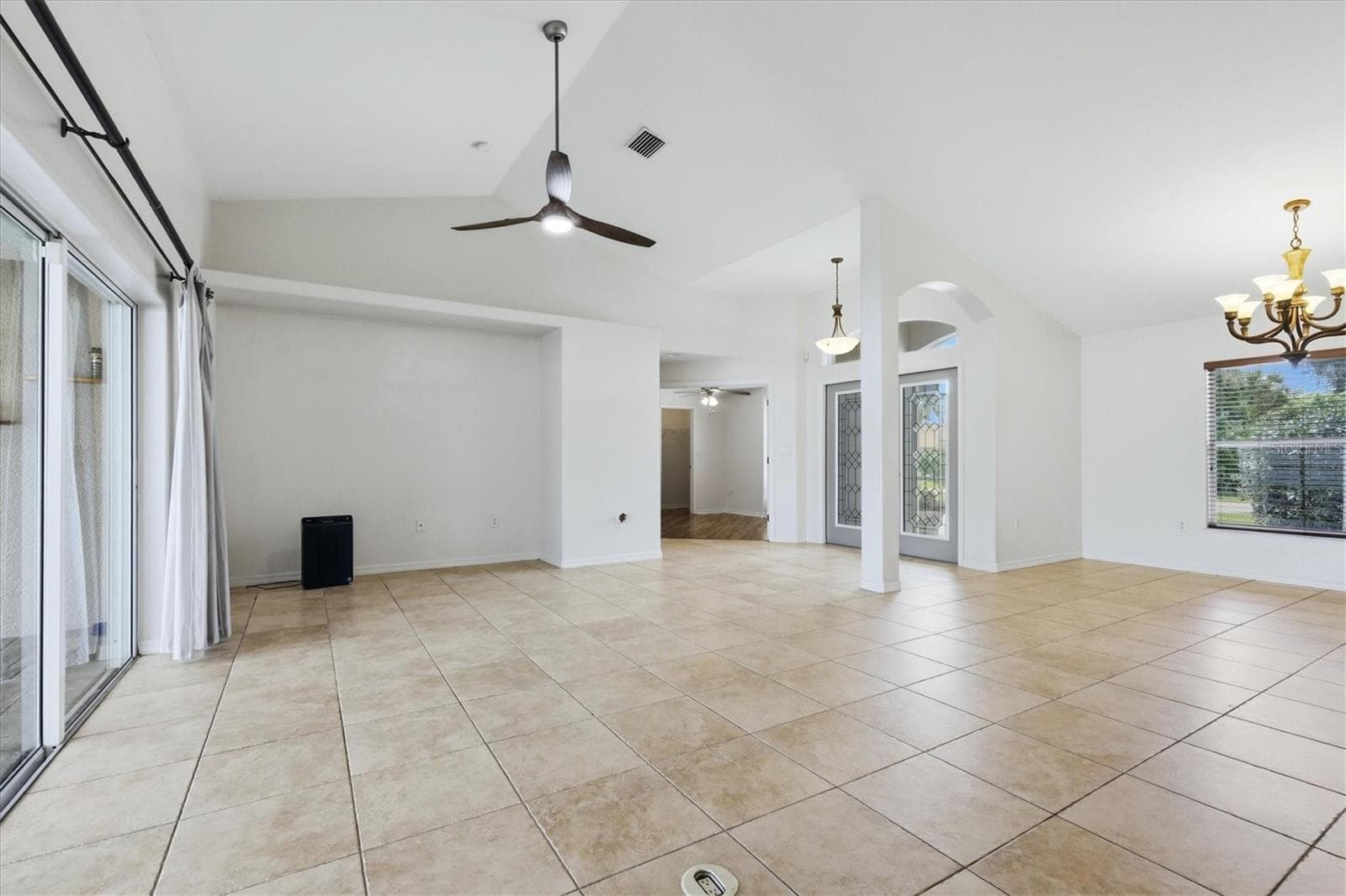 view of living/dining areas from kitchen nook - 23108 AUGUST AVE, PORT CHARLOTTE