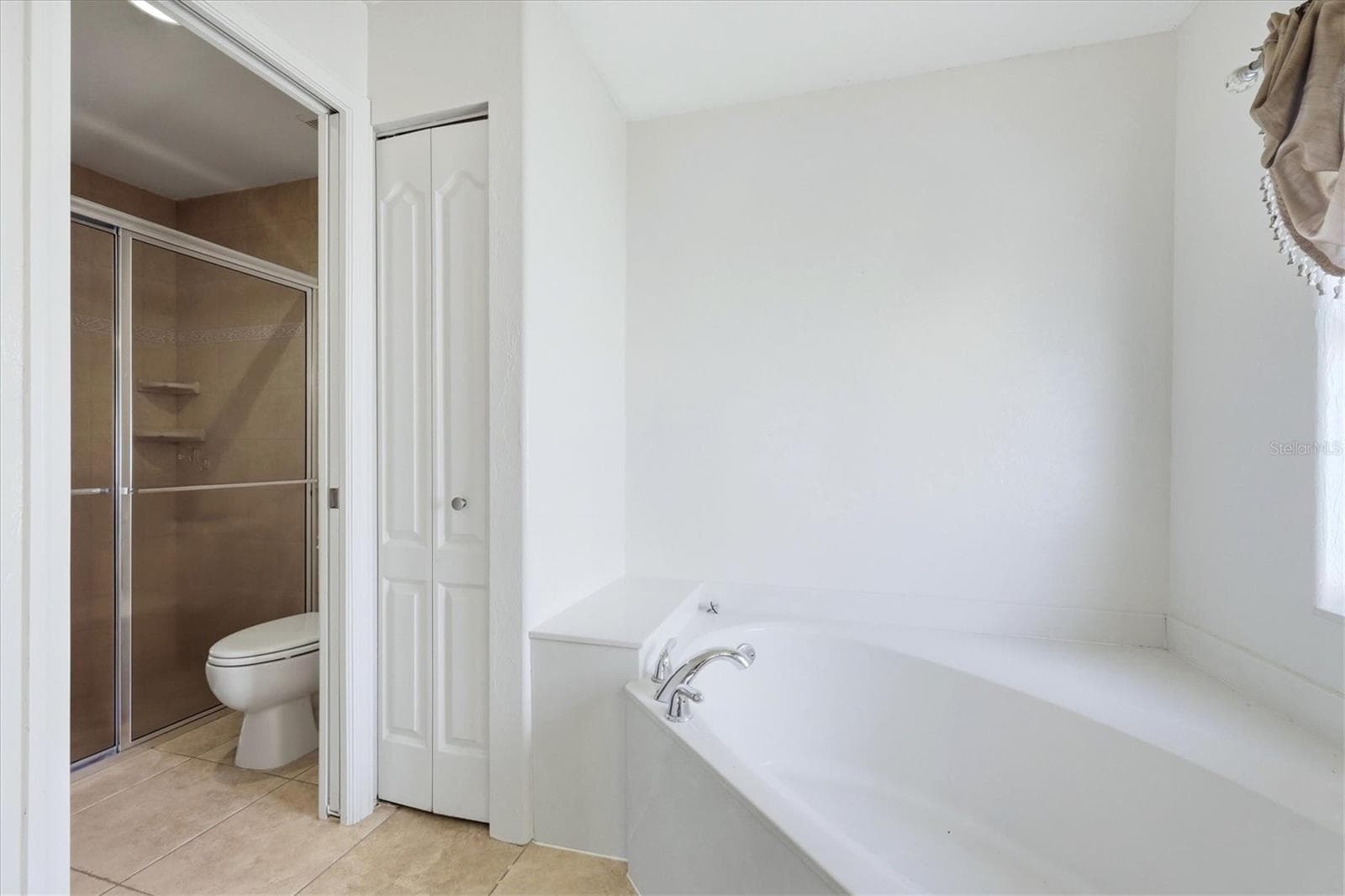 garden tub and toilet/shower through pocket door - 23108 AUGUST AVE, PORT CHARLOTTE