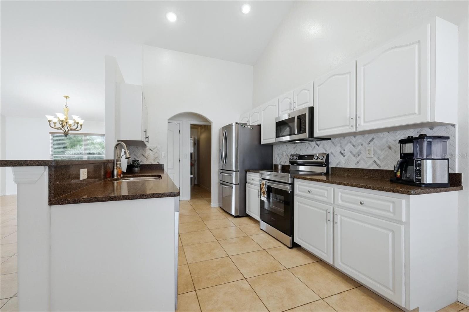 kitchen view from breakfast nook - 23108 AUGUST AVE, PORT CHARLOTTE