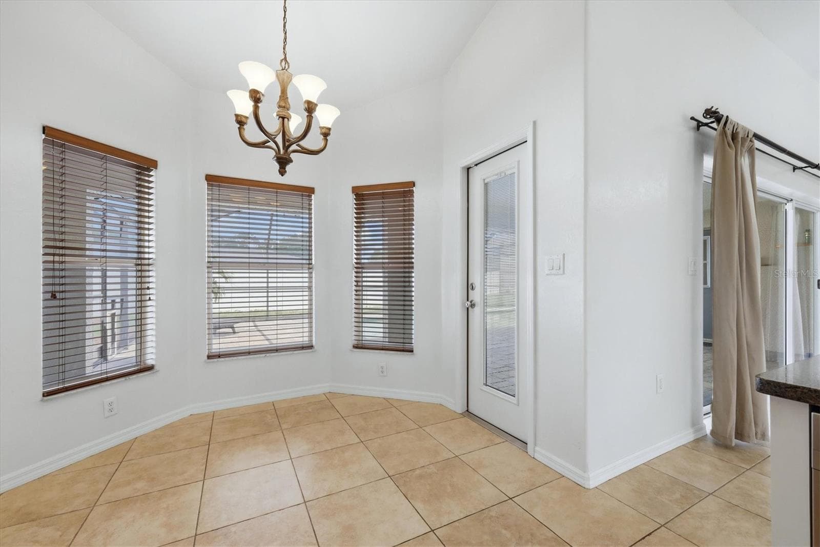 informal dining here at the breakfast nook or even the breakfast bar - don't you love options - 23108 AUGUST AVE, PORT CHARLOTTE